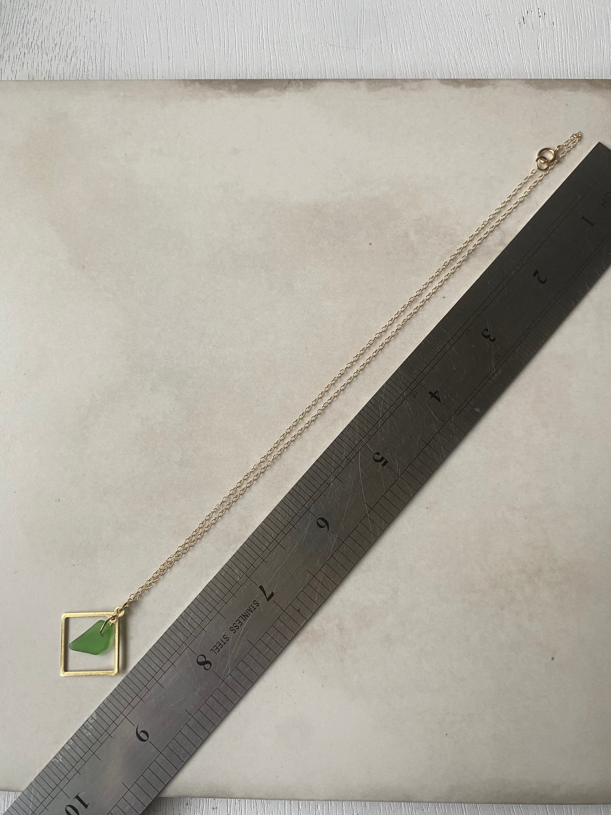 Joy sea glass necklace: Brass square (vibrant green)