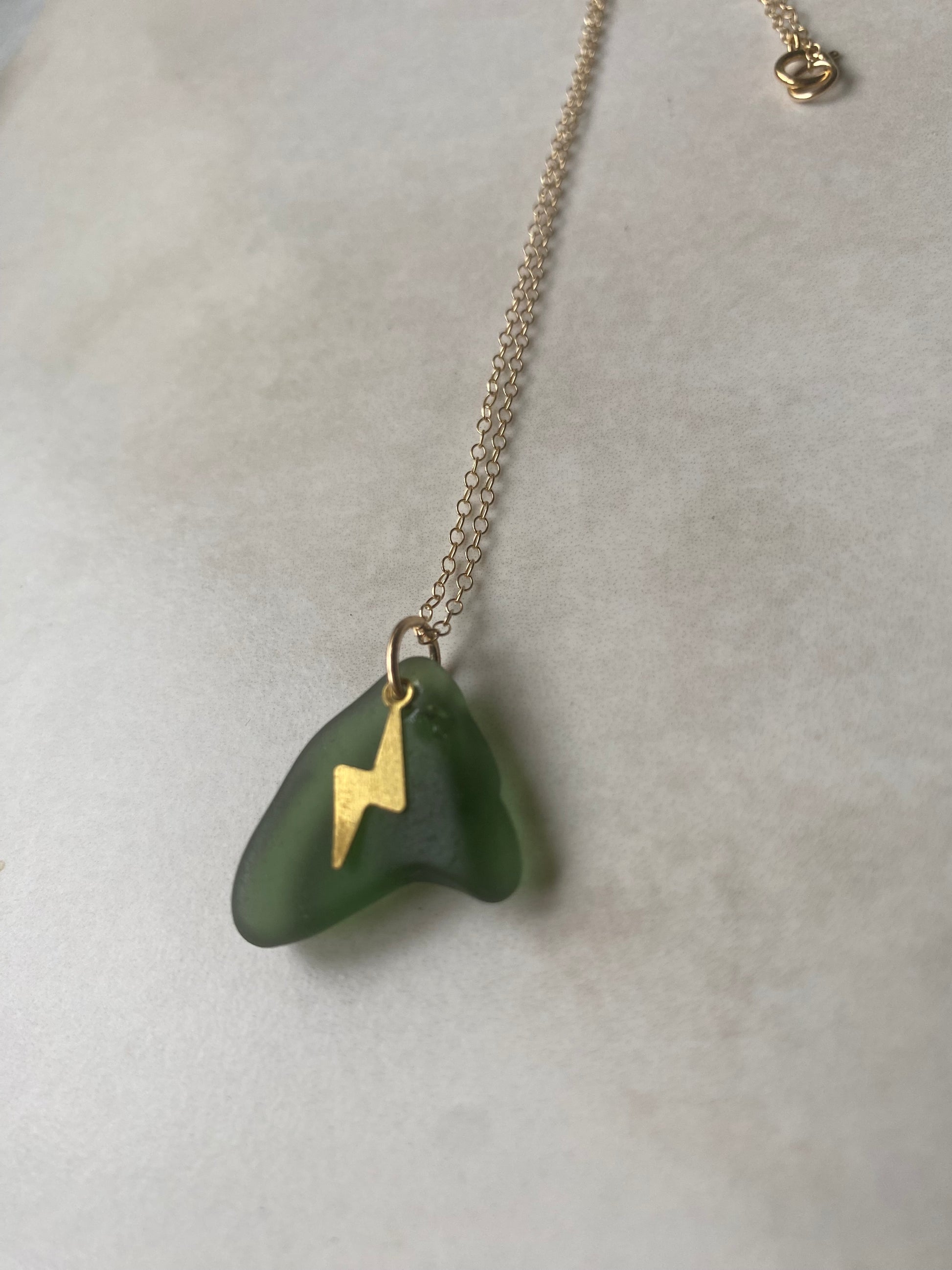 Joy sea glass necklace: Brass lightening bolt (green)