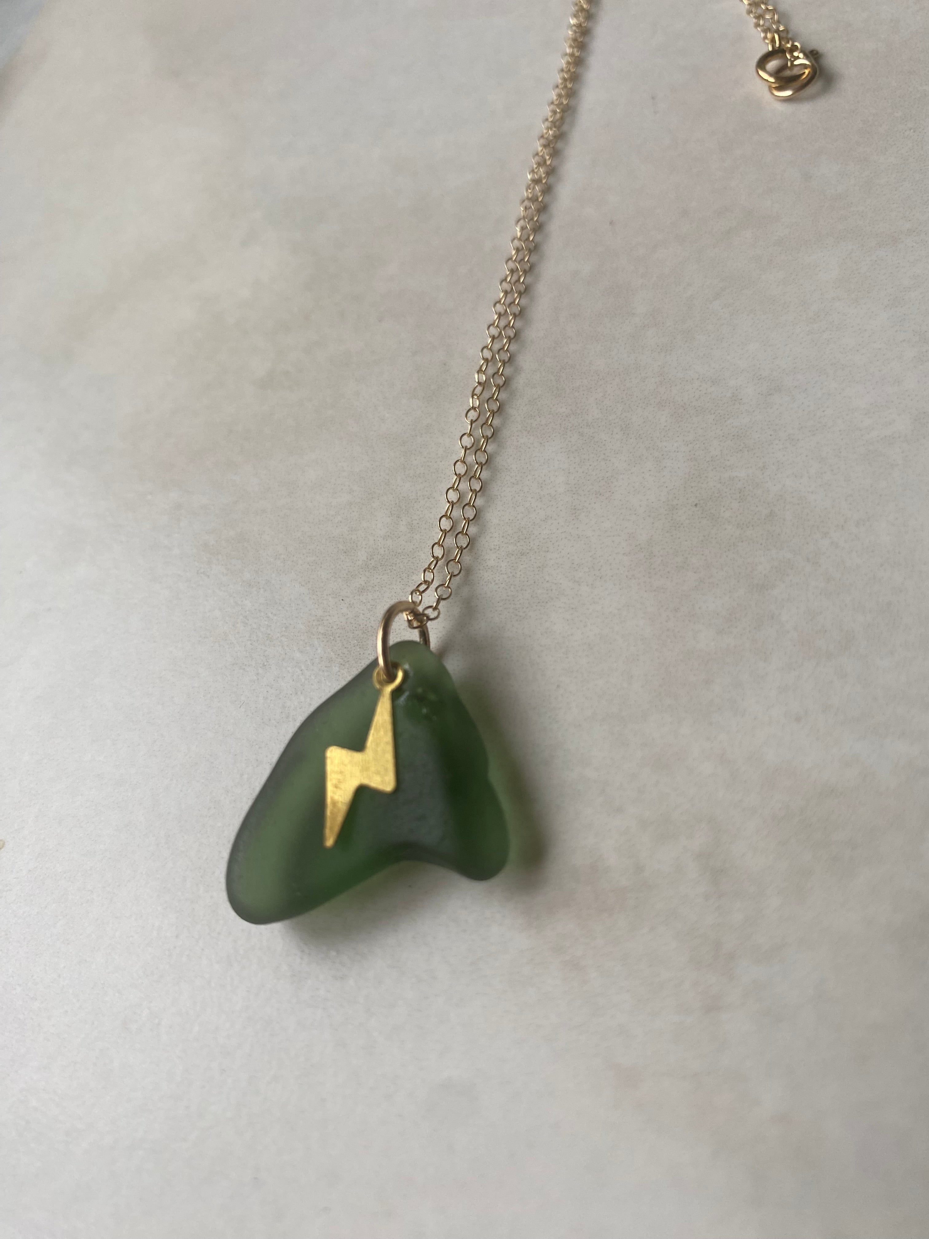 Joy sea glass necklace: Brass lightening bolt (green)
