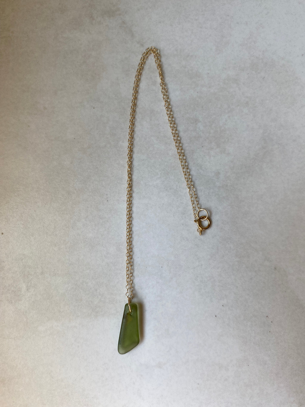 Joy sea glass necklace: Brass bolt (green)