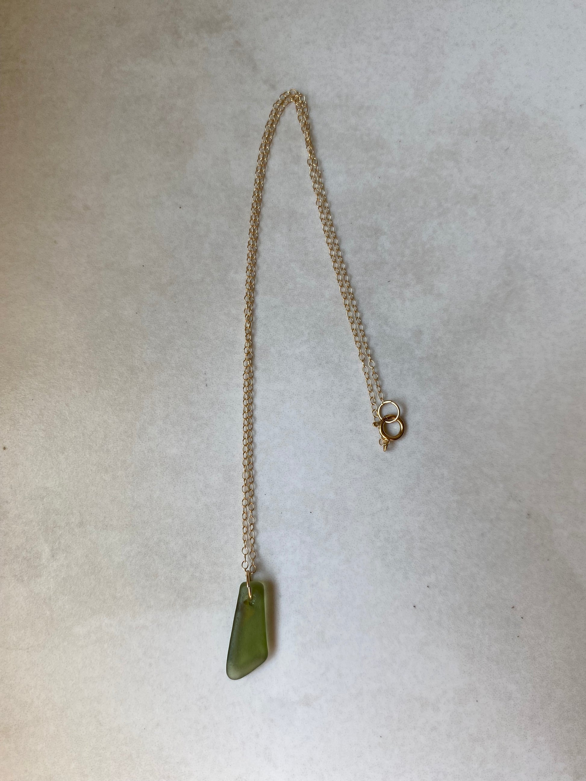 Joy sea glass necklace: Brass bolt (green)