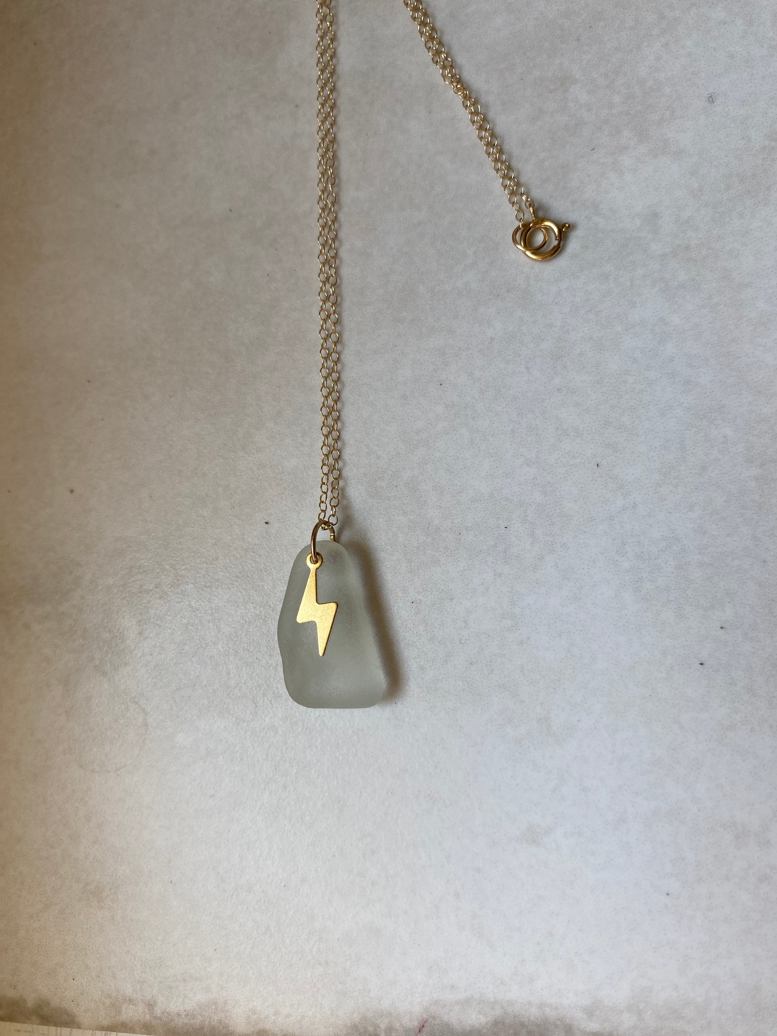 Joy sea glass necklace: Brass lightening bolt (white)
