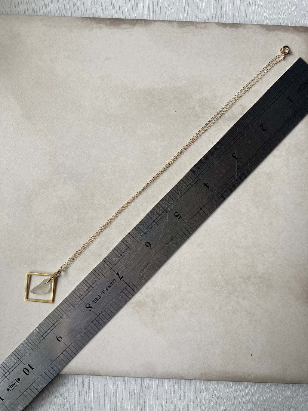 Joy Sea Glass necklace: Brass square (white)