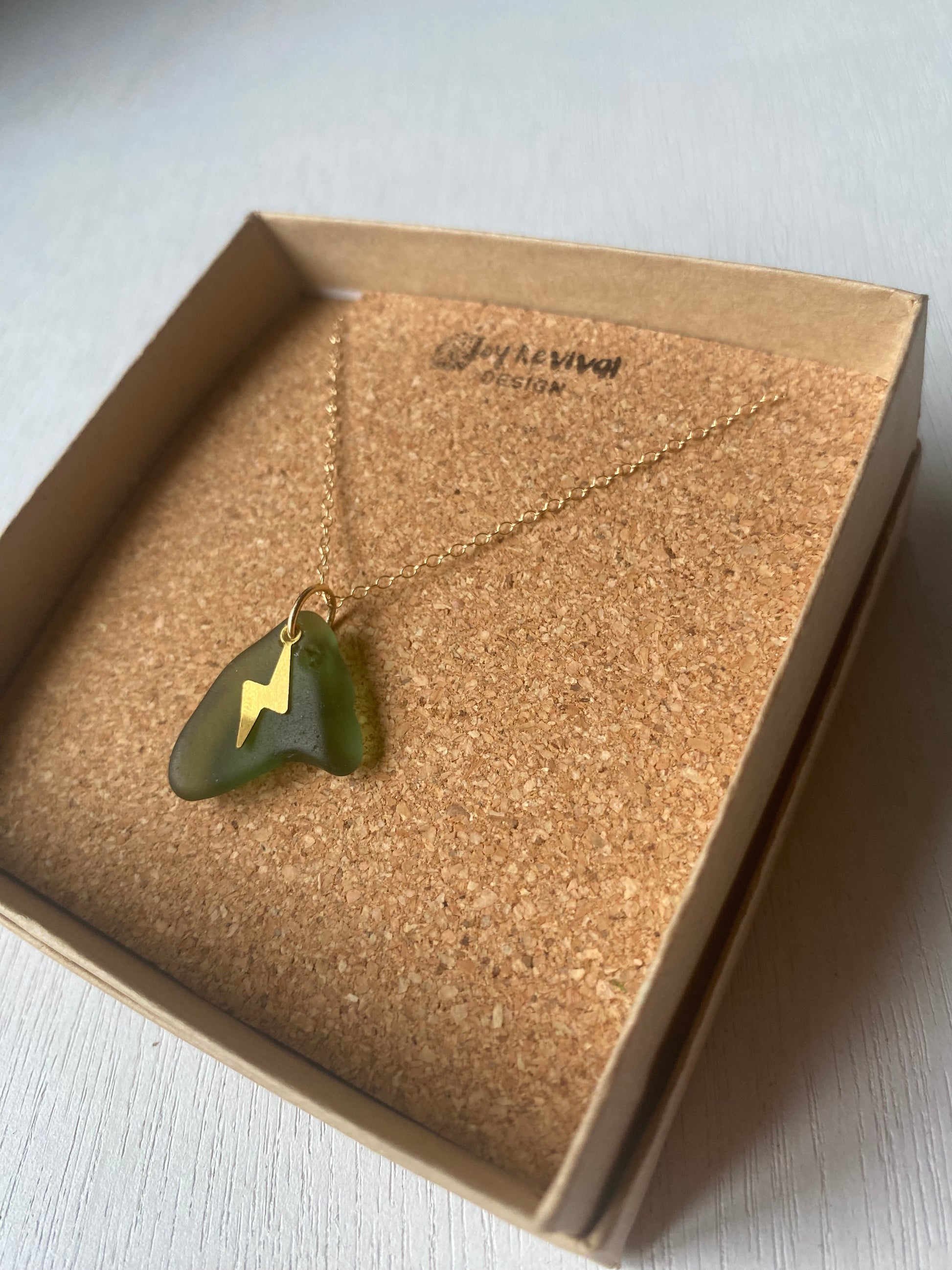 Joy sea glass necklace: Brass lightening bolt (green)