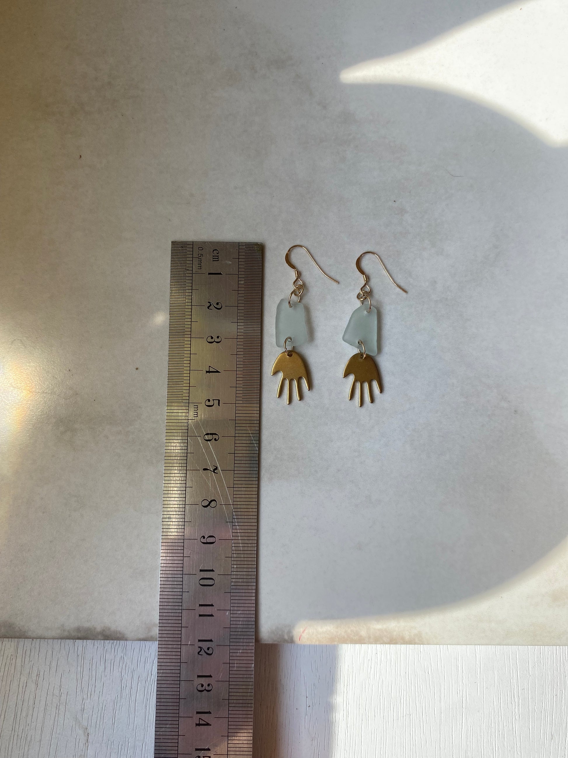 Joy Sea Glass Earrings : Brass Hands - Aqua sea glass