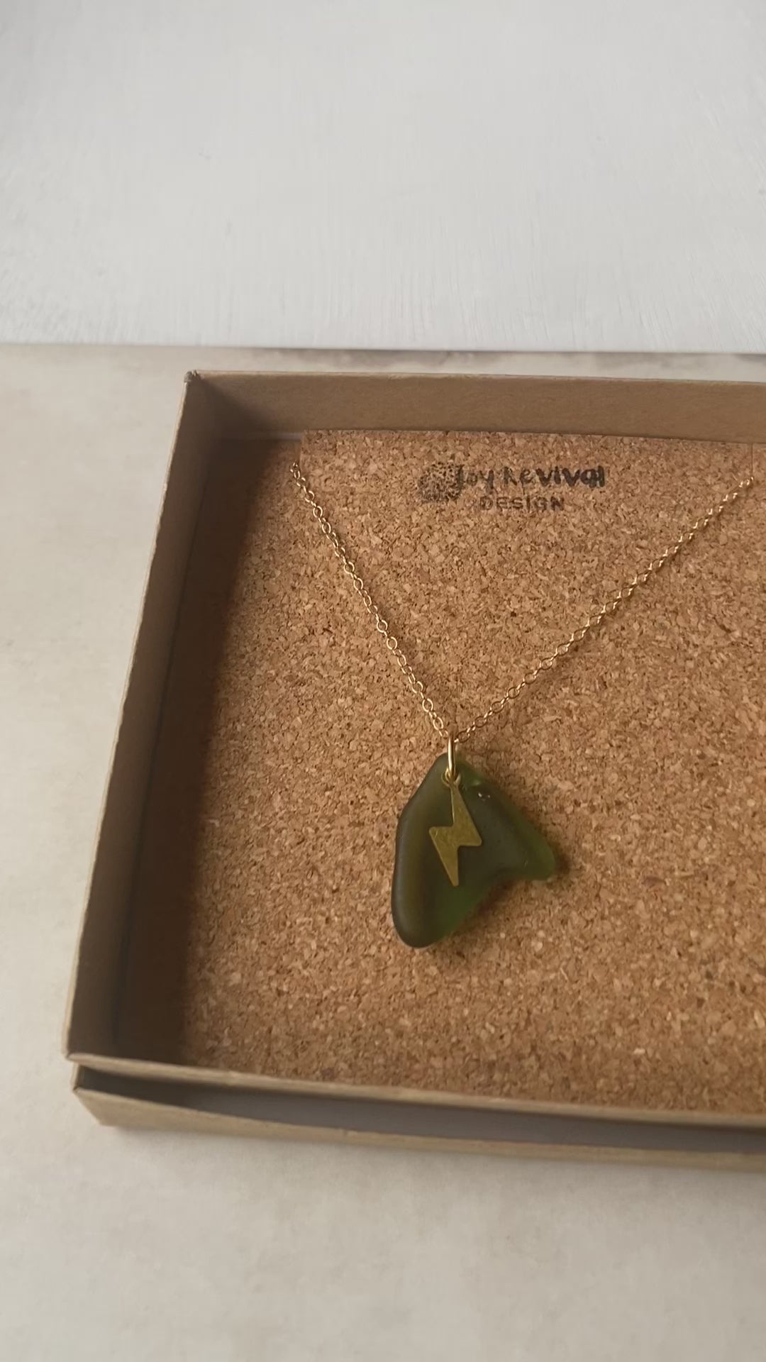 Joy sea glass necklace: Brass lightening bolt (green)