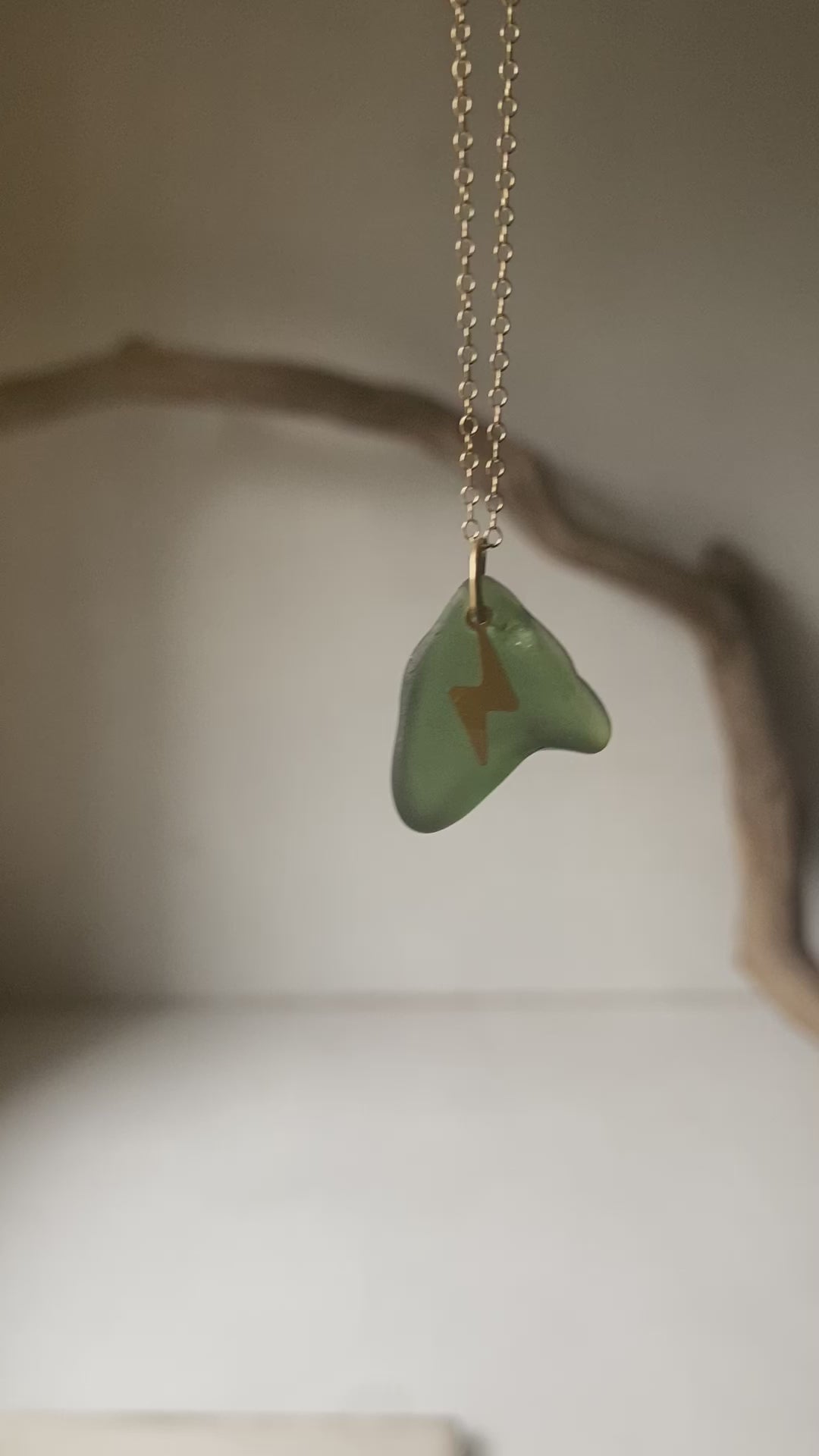Joy sea glass necklace: Brass lightening bolt (green)